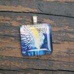 Iris Pendant on Black Cord 