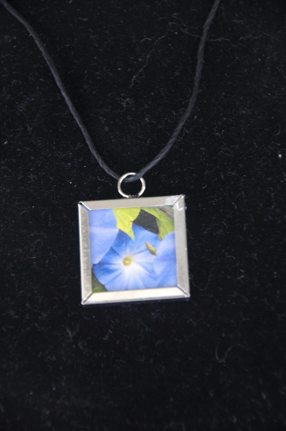 Morning Glory Pendant on Black Cord