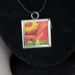 Orange Flower Pendant on Black Cord